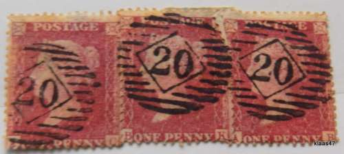 GB - One Penny - Red - Three Used stamps still on paper.