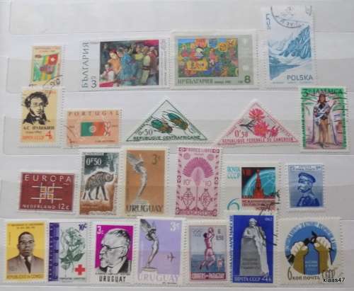 World Mix - Lot of  22 Used and Unused stamps (some hinged)