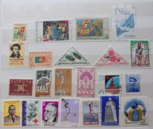 World Mix - Lot of  22 Used and Unused stamps (some hinged)