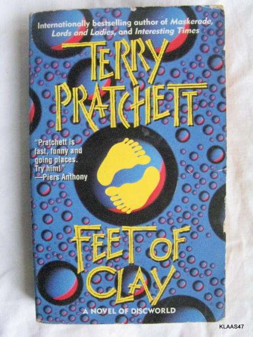 FEET OF CLAY BY TERRY PRATCHETT ( A novel of discworld  )