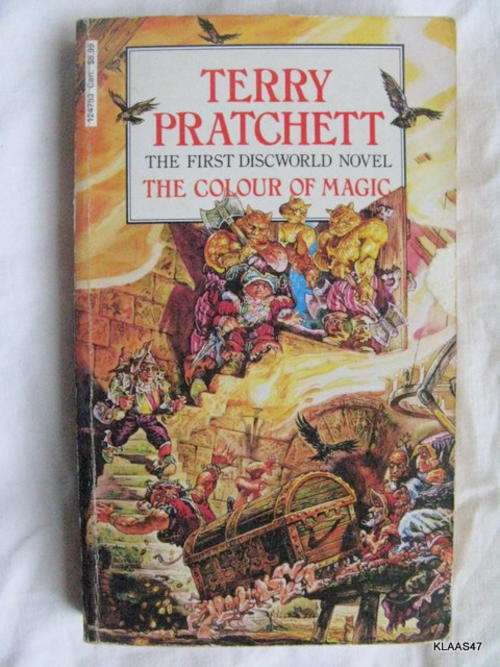 THE COLOUR OF MAGIC BY TERRY PRATCHETT  PAPERBACK  (The first discworld novel )