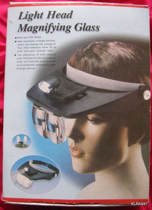 LIGHT HEAD MAGNIFYING GLASS  with FOUR LENSES LIGHT IS LOOSE