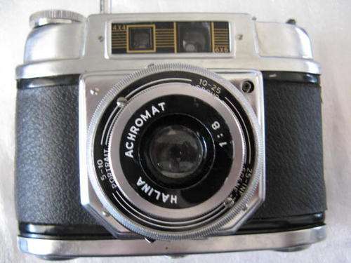 HALINA  6-4   ACHROMAT  :medium format camera. It uses 120 CAMERA  : NOT TESTED : WITH LEATHER COVER