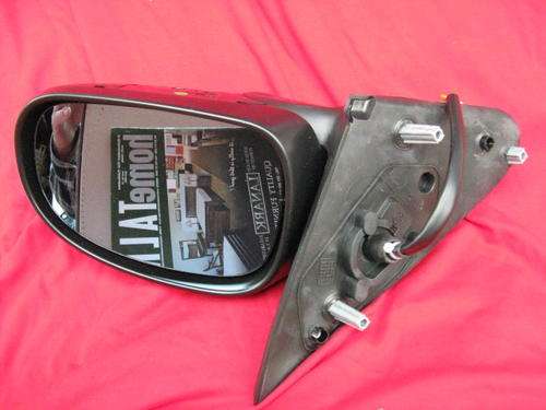 SIDE MIRROR FOR VEHICLE  - (nissan almera) :  R36 FOR POSTAGE.
