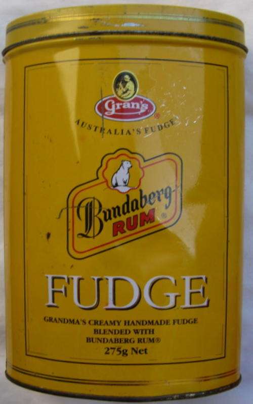 GRAN'S TIN : (AUSTRALIA'S FUDGE) : OVAL TIN - 10.8cm LONG - 5.2cm WIDE - 16.2cm HIGH :**CLEAN INSIDE