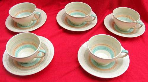 SUSIE COOPER : 5 TEA CUPS & SAUCERS : WEDDING RING PATTERN - TAN/RUST/GREEN CONCENTRIC BANDS