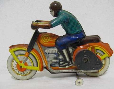 TIN MOTORBIKE :  WIND UP  : NO MANUFACTURERS MARKINGS - IT LOOKS LIKE A LEHMAN  RIDER & BIKE