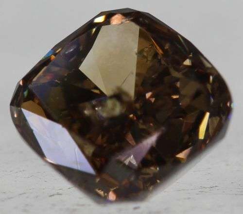 IGL Cert. Natural Cushion Cut Fancy Vivid Brown Diamond: 0.93ct SI2  R78 000 Certificate