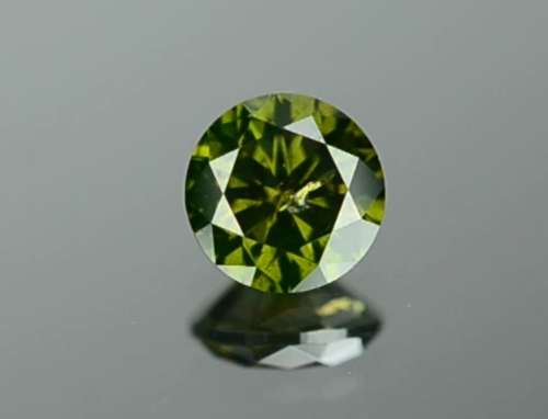 Matching Pair of 1.03tcw Fancy Vivid Green Brilliant Round Cut Natural Diamonds! R72 500