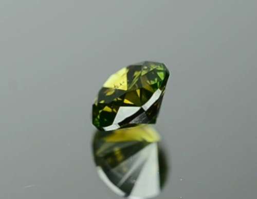 Matching Pair of 1.03tcw Fancy Vivid Green Brilliant Round Cut Natural Diamonds! R72 500