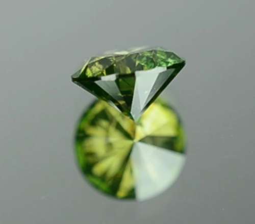 Matching Pair of 1.03tcw Fancy Vivid Green Brilliant Round Cut Natural Diamonds! R72 500