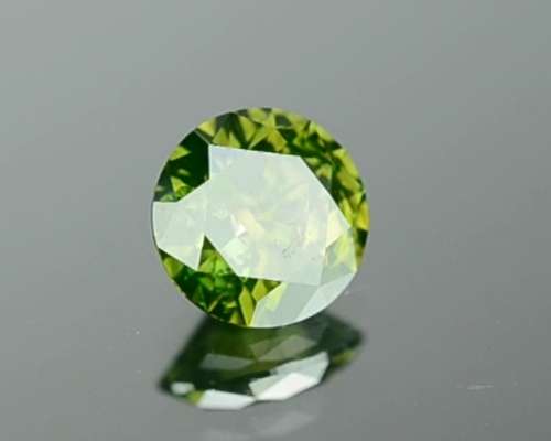 Matching Pair of 1.03tcw Fancy Vivid Green Brilliant Round Cut Natural Diamonds! R72 500