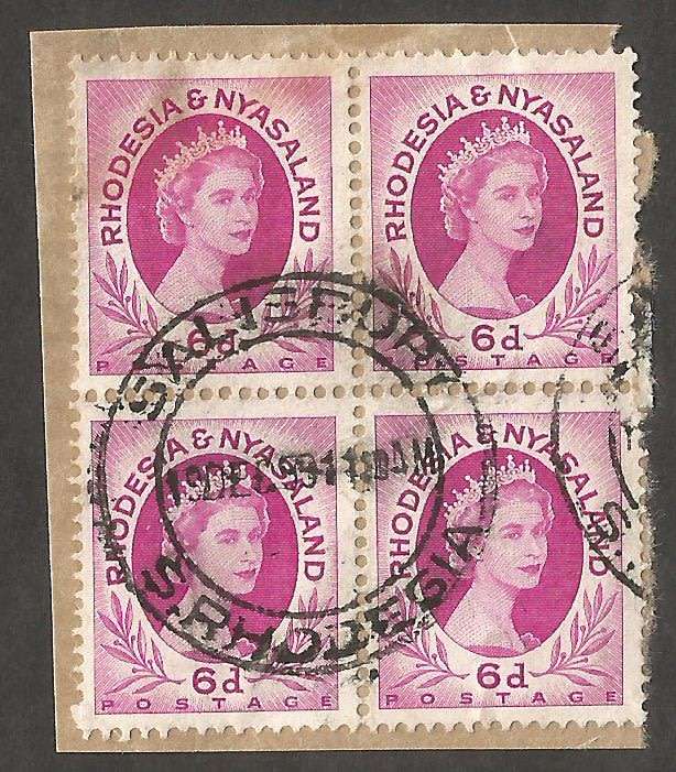 Rhodesia & Nyasaland 6d- Block of 4 stamps on paper Used - Cancel - Post mark- Postmark