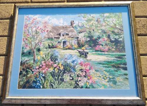 Framed Handmade Tapestry of a cottage and a Garden-Wall Decor