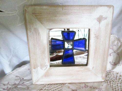 Blue lead glass cross on mirror in Rustic frame