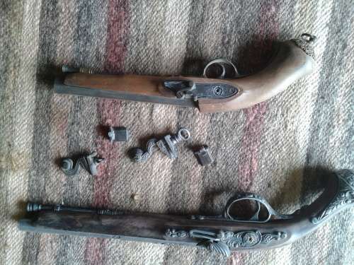 Two decorative pistols, need tlc