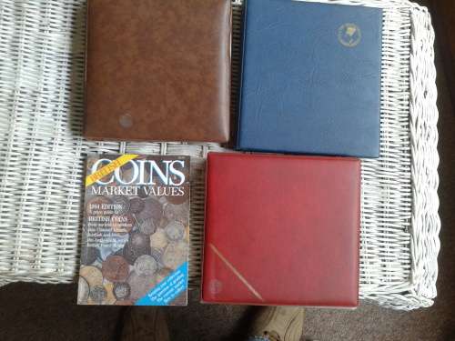 3 coin albums and 1994 British coins evaluator