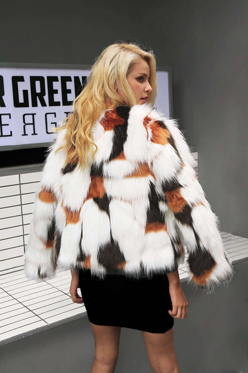 Womans warm winter fluff faux fur coat