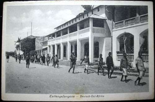 GERMAN EAST AFRICA - CHAINED PRISONERS OFF TO WORK - VINTAGE POSTCARD  - GOOD CONDITION.