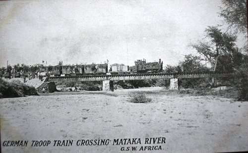 GERMAN TROOP TRAIN CROSSING BRIDGE IN GSWA - SOME VERY MINOR IMPERFECTIONS.