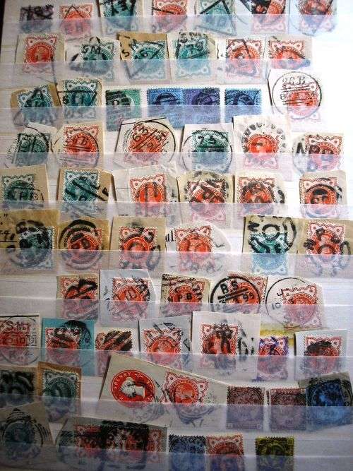 UK STOCKBOOK ( PRESENTABLE ,CLEAN - 16 PAGES) - LONDON POSTMARKS AND OTHER ITEMS - ONE QUATER FULL.