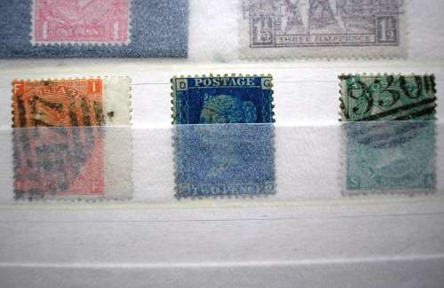 UK STOCKBOOK ( PRESENTABLE ,CLEAN - 16 PAGES) - LONDON POSTMARKS AND OTHER ITEMS - ONE QUATER FULL.