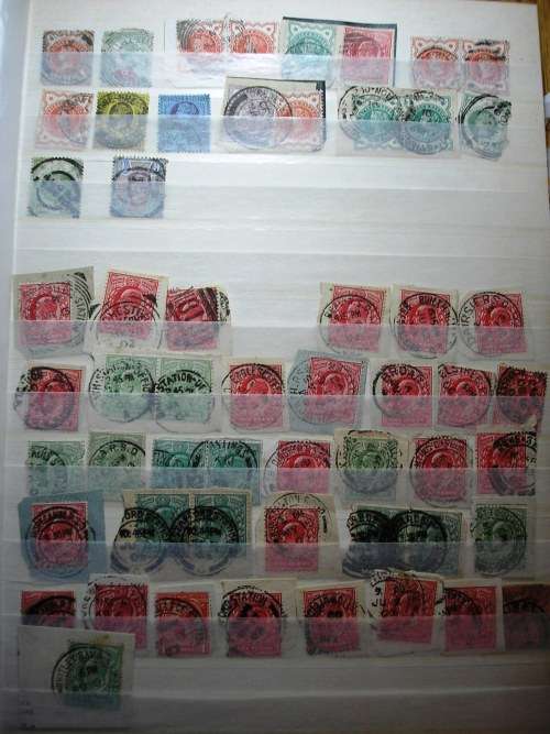 UK STOCKBOOK ( PRESENTABLE ,CLEAN - 16 PAGES) - LONDON POSTMARKS AND OTHER ITEMS - ONE QUATER FULL.