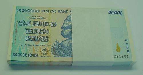 BULK  100 Trillion $ notes From Zimbabwe... Still in paper band,,, UNC UNC UNC condition....