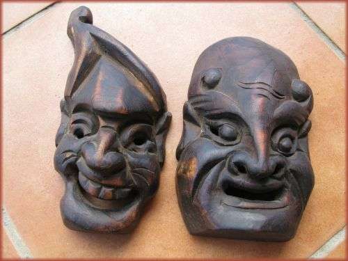 Two small masks - Comedy and Tragedy. Greek. Height 19cm