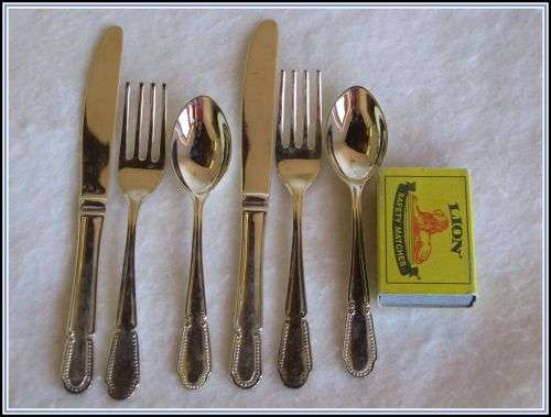 Two sets of children's cutlery