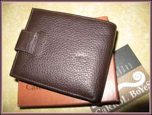 Man's wallet. Genuine leather. Carrol Boyes in original box.