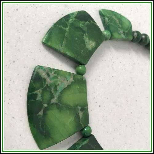 An unusual green stone necklace.