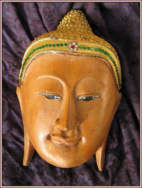 Wooden mask with gilded headress. Buddha Thailand.