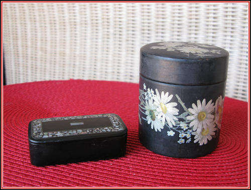 Two black trinket boxes.