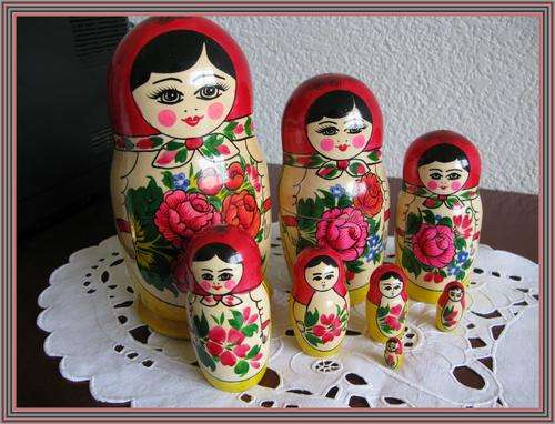 Large Russian "Babushka" with 8 dolls. Height 21cm.