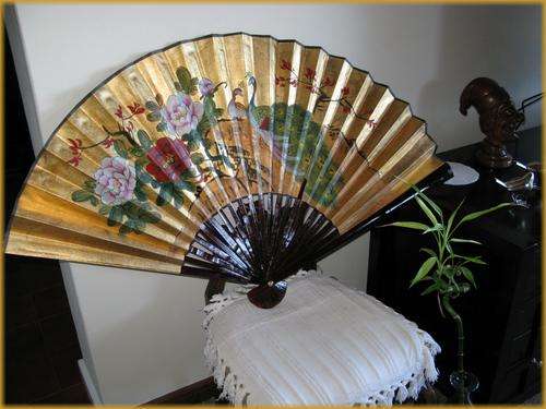 A large Chinese ornamental fan. Needs a bit of TLC. Hand painted.