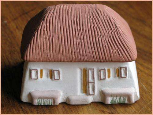 Bisque clay house as trinket box. Antilles, Curacao.