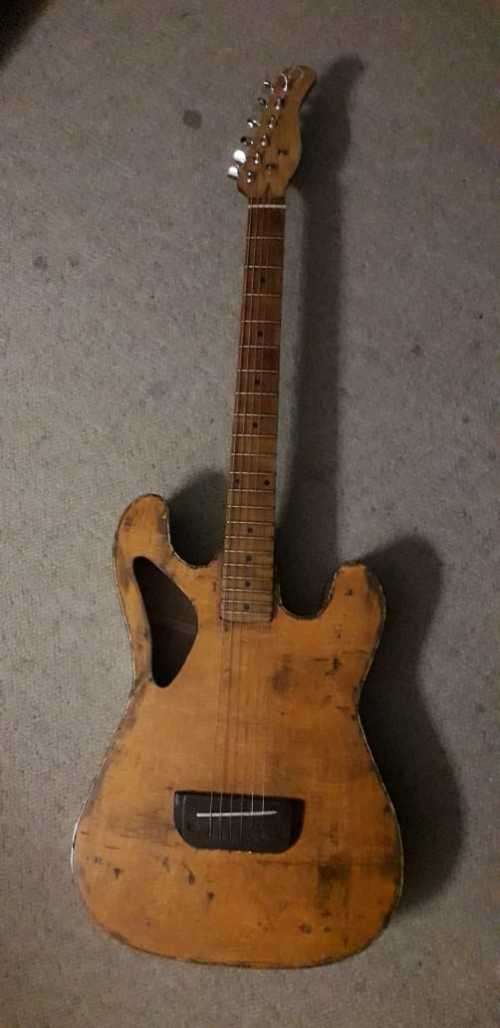 Guitar - Strat-shape semi-acoustic