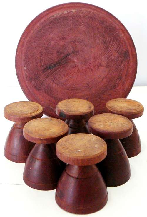 A Set of 6 Hand Turned Wooden Egg Cups on a Stand