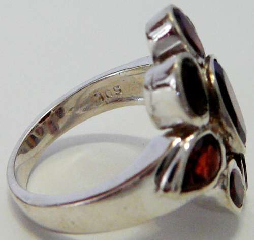 Absolutely Stunning Sterling Silver Ring set with 9 Garnets