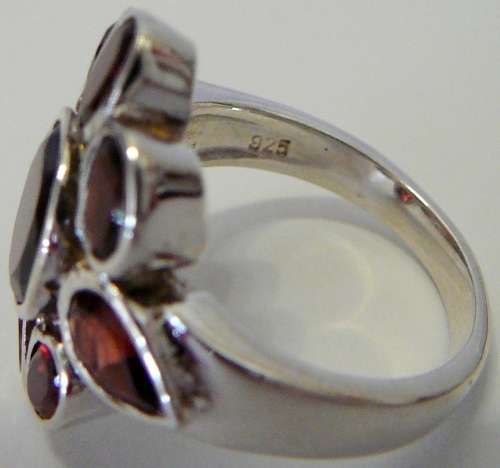Absolutely Stunning Sterling Silver Ring set with 9 Garnets