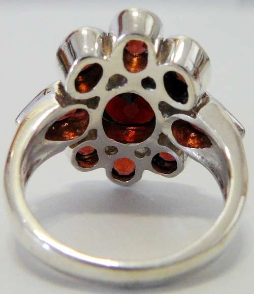 Absolutely Stunning Sterling Silver Ring set with 9 Garnets