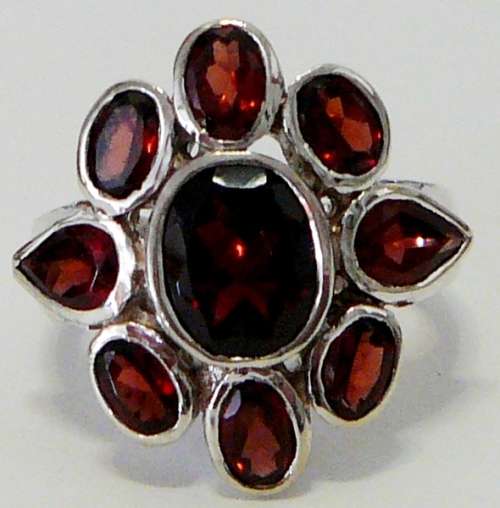 Absolutely Stunning Sterling Silver Ring set with 9 Garnets