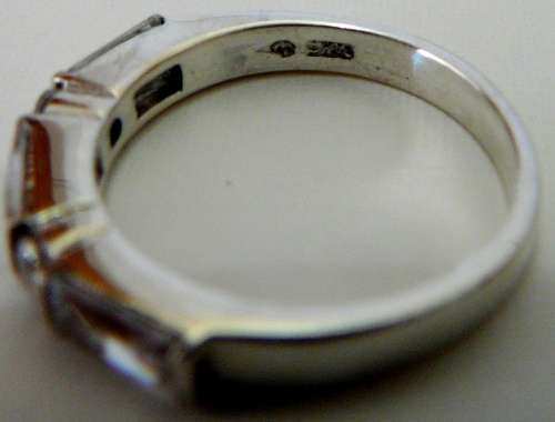 Sterling Silver Ring set with 3 Baguette Cut CZ's & 2 Round CZ's