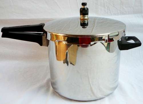A DURAWARE Pressure Cooker complete with all Accessories.