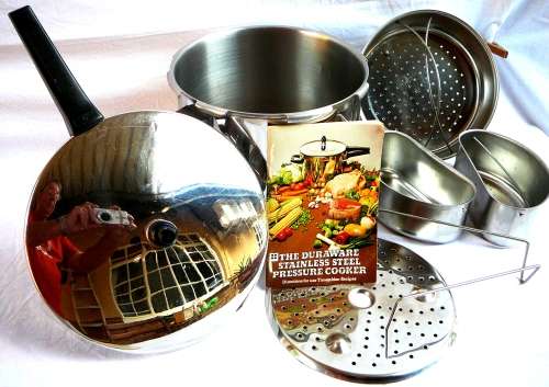 A DURAWARE Pressure Cooker complete with all Accessories.