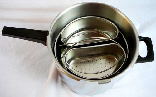 A DURAWARE Pressure Cooker complete with all Accessories.