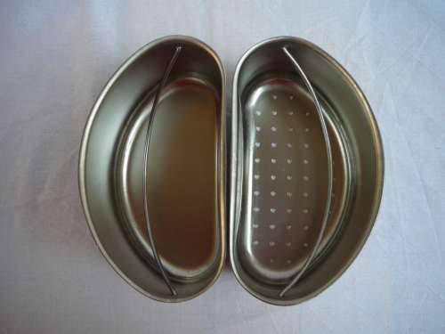 A DURAWARE Pressure Cooker complete with all Accessories.