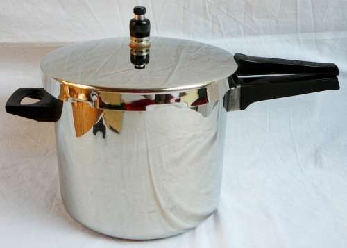 A DURAWARE Pressure Cooker complete with all Accessories.