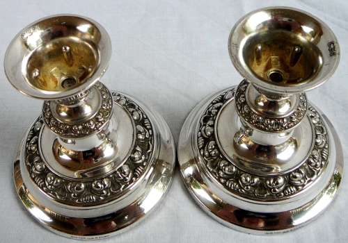 A Pair of Silver Plated Candle Holders by IANTHE